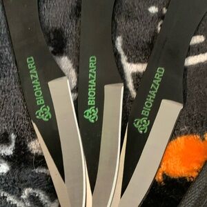 Biohazard throwing knives